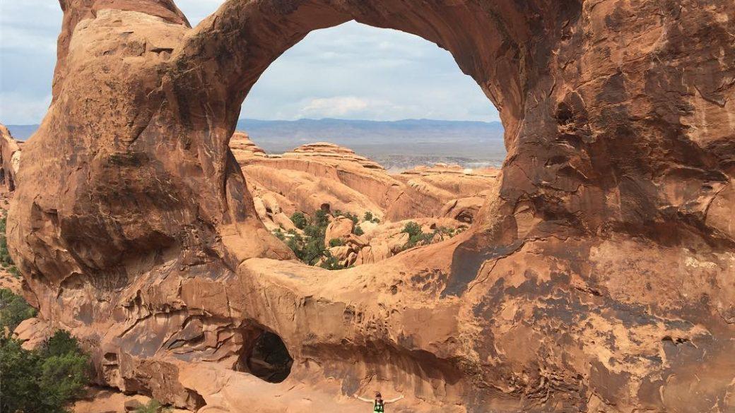 Double Os in Arches National Park ft. Little green dot below arch #utahgram