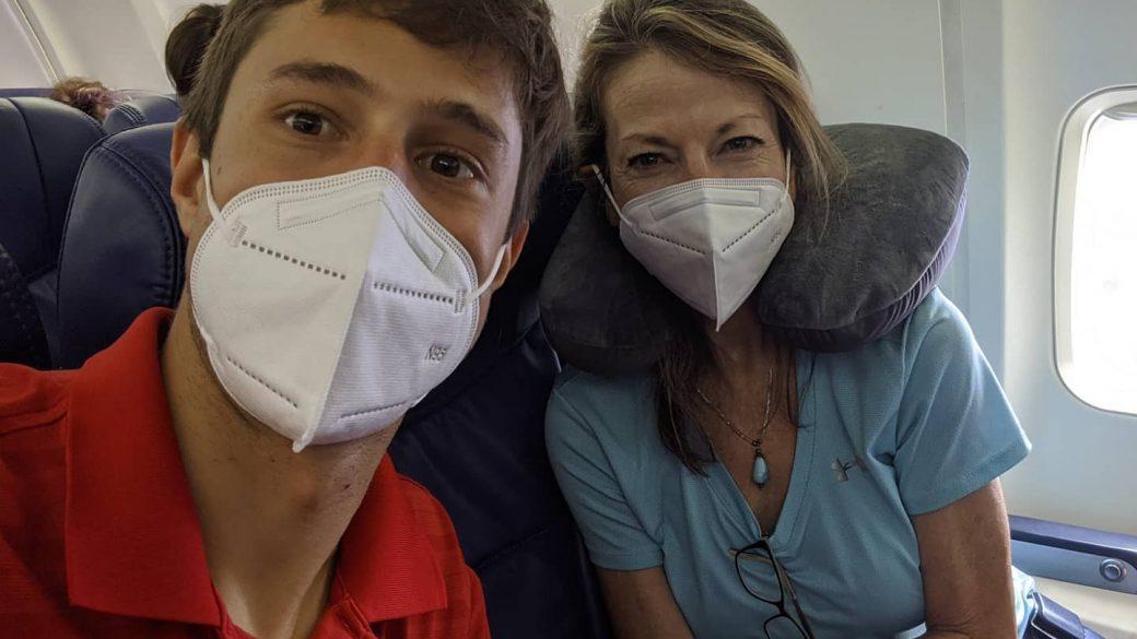 Florida bound with the madre! (You can’t tell but we’re smiling) 🤞we don’t get the covid